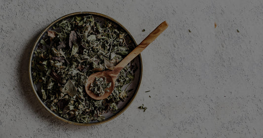 Organic Assam green tea leafs